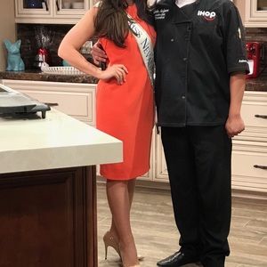 Orange business style dress with cut outs on back